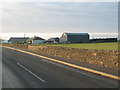 Farm buildings from the B842 near Stewarton. in PA28 6PF
