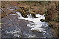 The Melgam Water cascades down over the rocks at Bridgend of Lintrathen Village in DD8 5JH