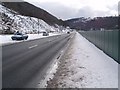 Snowy road scene in Cwm in Cwm Community