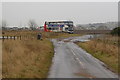 View of Forfar / Kirriemuir Road at its junction with the Bogside Farm Road in DD8 3FH