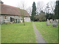 Path within Ropley Churchyard in SO24 0BX