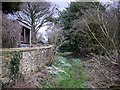 Footpath by garden wall of Dalton House in NE18 0AX