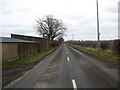 Farm buildings at the side of the B6460 in TD11 3LZ