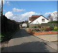 View north (downhill) along Back Street in NR10 3JF