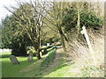Looking westwards on the footpath above All Saints, East Meon in GU32 1PY