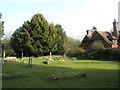 A quiet corner of the churchyard at All Saints', Steep in GU32 2DB