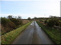 Straight stretch of road leading to Pont Pensarn bridge in LL69 9UF