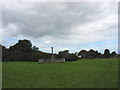 The Green at Marian Glas  and the village's War Memorial in LL73 8PF