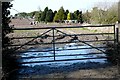 Muddy gate at Holly Farm in DT2 8HZ