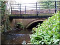 Wesley Brook runs under bridges in Haughton Lane in TF11 8HA