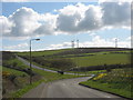 Approaching the junction with the A5025 on the outskirts of Cemaes in LL67 0NN