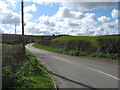 Minor road leading south from the A5025 in Llanbadrig Community