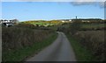 View back along the road towards the A5025 in Llanbadrig Community