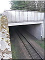 Railway emerges from under the A9 in PH16 5JZ