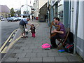 Harpist in Fishguard Square in SA65 9HE