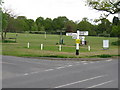 Road junction in Barns Green in RH13 0PS