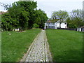 Pathway leading to Chapel Street Minster in ME12 3RZ