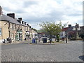 Market Place and High Street, Belford in NE70 7NX