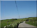 The road westwards between Pentreheulyn and Clegyrog Blas in LL68 0NY