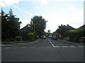 Looking from Larchwood Drive into Magna Road in TW20 0BA