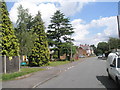 Distant postbox in Northcroft Road in Englefield Green West Ward