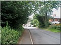 Looking down Northcroft Lane towards Northcroft Villas in TW20 0PX