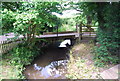 Wooden bridge over the River Bourne, Hamptons Rd in TN11 9SH