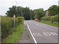 Road bend at Povey Cross in RH6 0BG