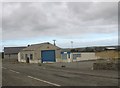 Disused service station and garage at Llynfaes in Bodffordd Community