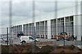 Looking through the fence at some new industrial units in WA8 0PA