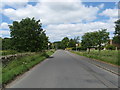 The B7059 entering West Linton in Peeblesshire in EH46 7JJ