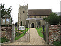 All Saints Church - entrance at Church Road in NR16 1RW