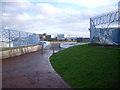 Footpath and railings on the seafront in LA4 4DD