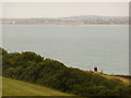 Osmington Mills: coast-path walkers and Weymouth view in DT3 6HQ