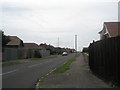 Looking down Nutbourne Road towards the beach in PO11 9SU