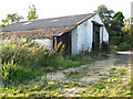 Farm shed beside footpath in Bramerton