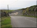 Road cutting north of Porth-y-post beach in LL65 2ZA