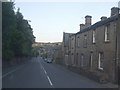 A635 towards Holmfirth town centre in HD9 2BA