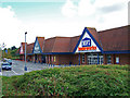 The Warren retail park in TN24 8XH