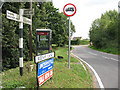 Phone box and signage, Roydon Hamlet in Roydon Hamlet