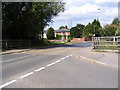 B1069 Leiston Road & Knodishall Village Sign in IP17 1UX