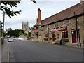 Rose & Crown with the church of St Mary in DT9 6RH