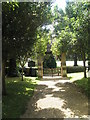 Looking towards the  gate at St John the Evangelist, Milton in OX15 4SX