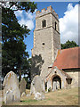 St Mary's church - tower and south porch in Ashby St. Mary