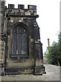 South west corner of St Giles with flush bracket S1202 in LL13 7LL