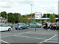 Tesco car park exit and petrol station in NG18 1NA