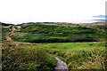 The South-West Coast Path runs through the dunes at Woolacombe in EX34 7BL
