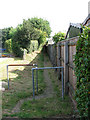 Narrow path beside the railway line in NR13 4FP