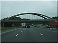 Railway bridge over M56 near Runcorn turnoff in WA7 3EZ