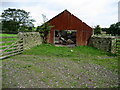 Dilapidated Garage below Leeds/Carlisle Line in BD23 1TW